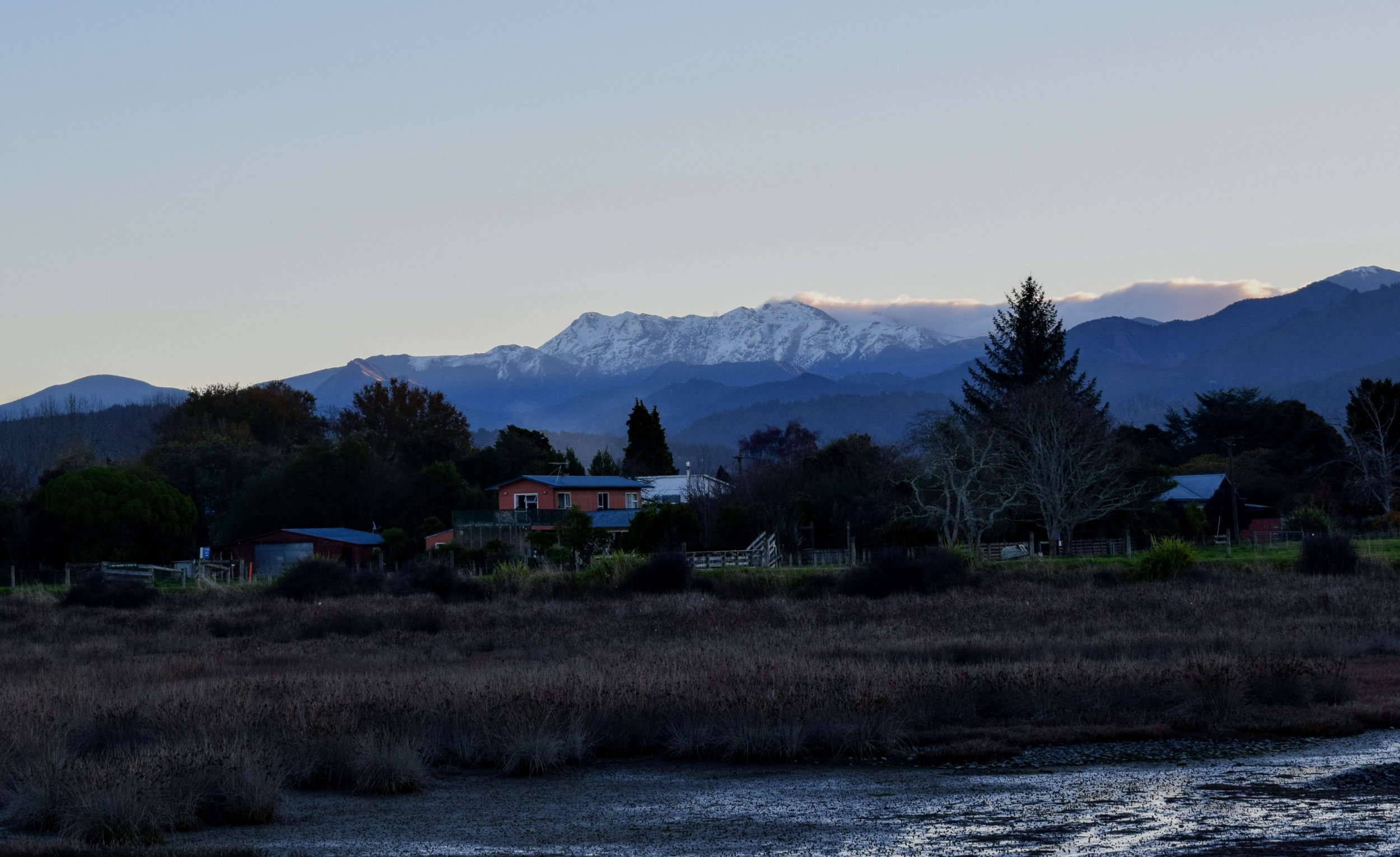 Kahurangi National Park's snow-capped Mount Arthur, as seen from the Motueka Inlet Walk.