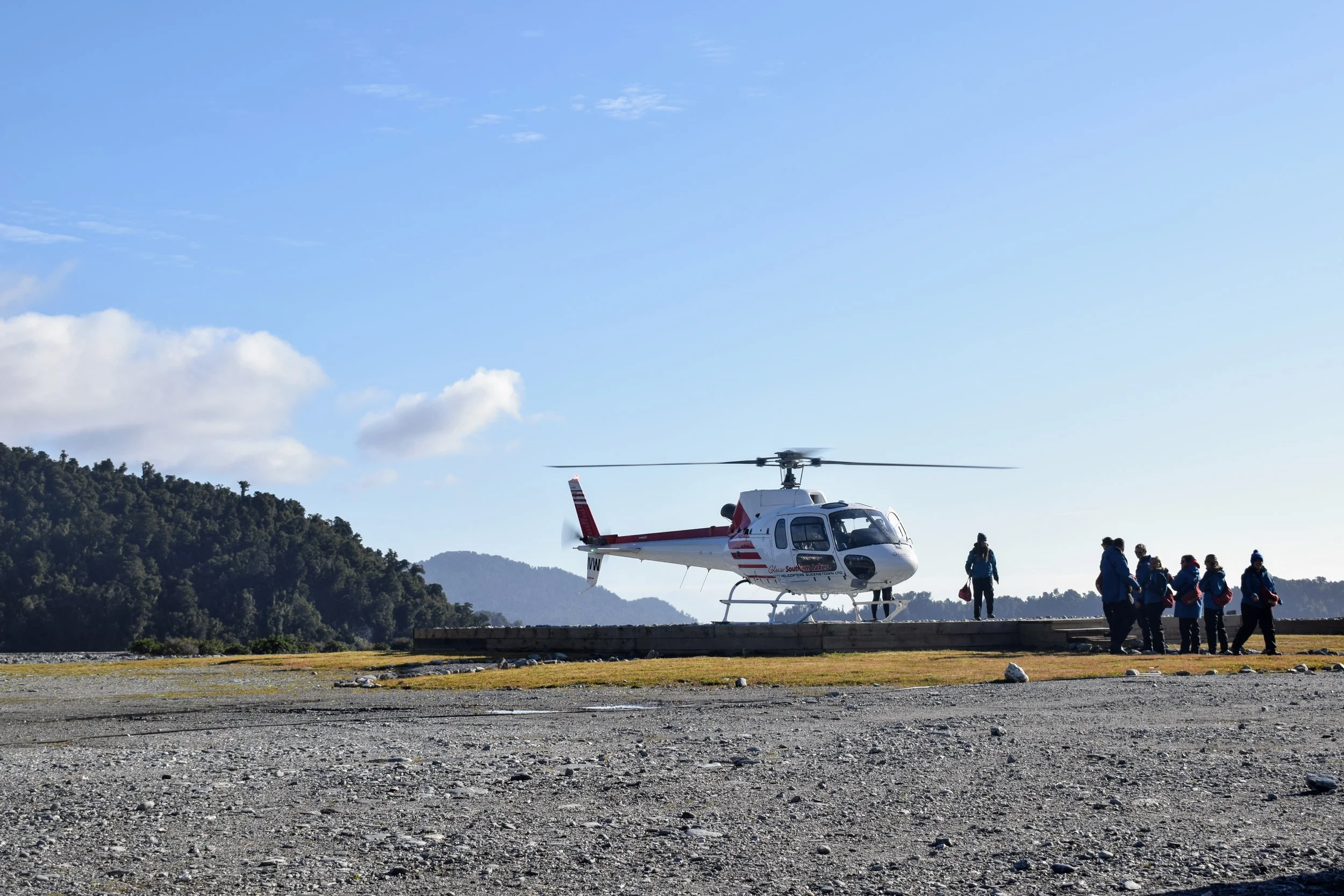 Another group gets on a helicopter