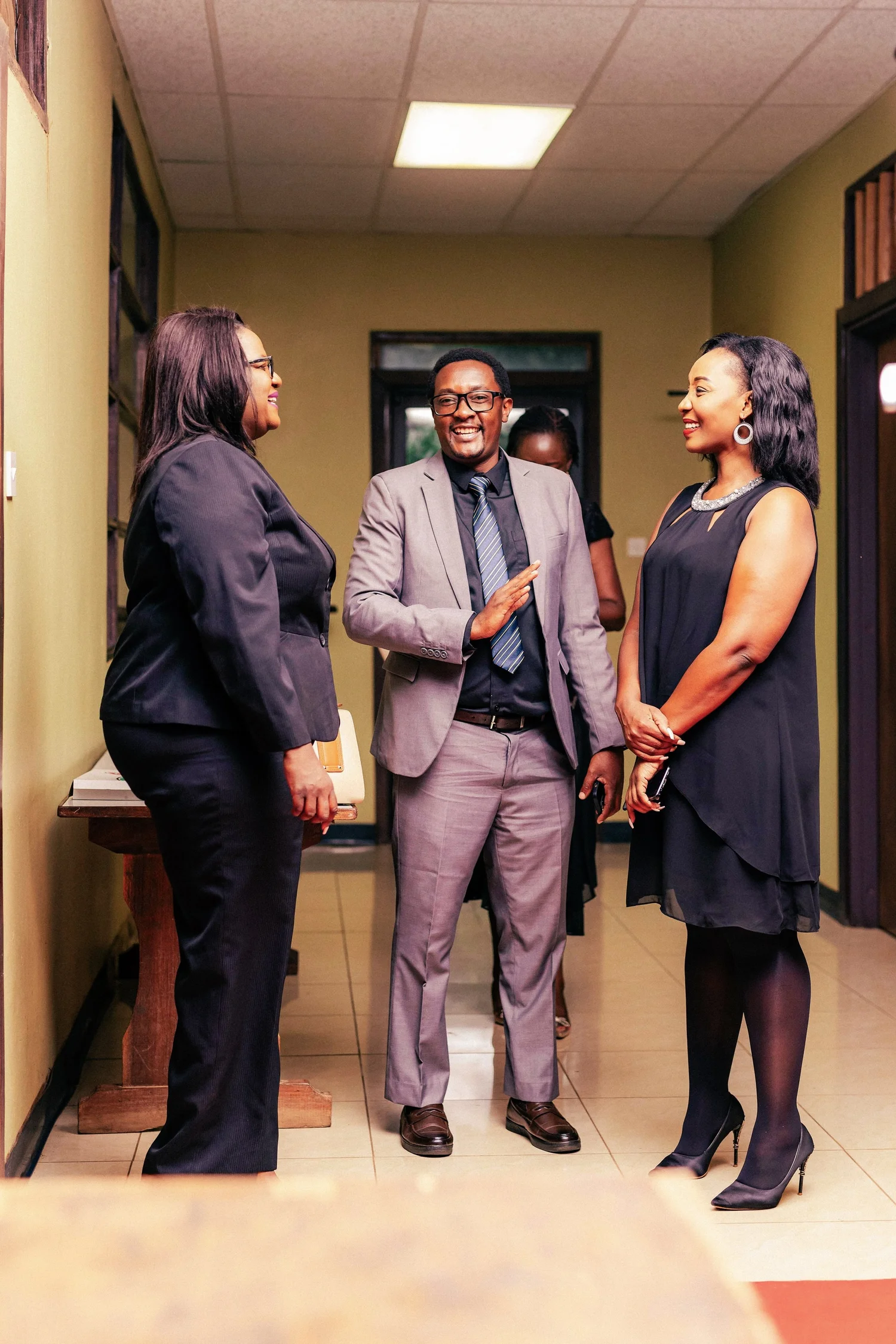 Local entrepreneurs talking together indoors