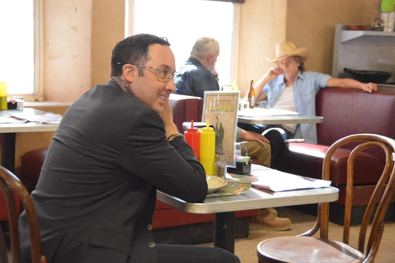 A man obsessed - PJ Byrne (Melvin) with Kevin Bacon (Val) and John Ellison Conlee (Harlan) in the background