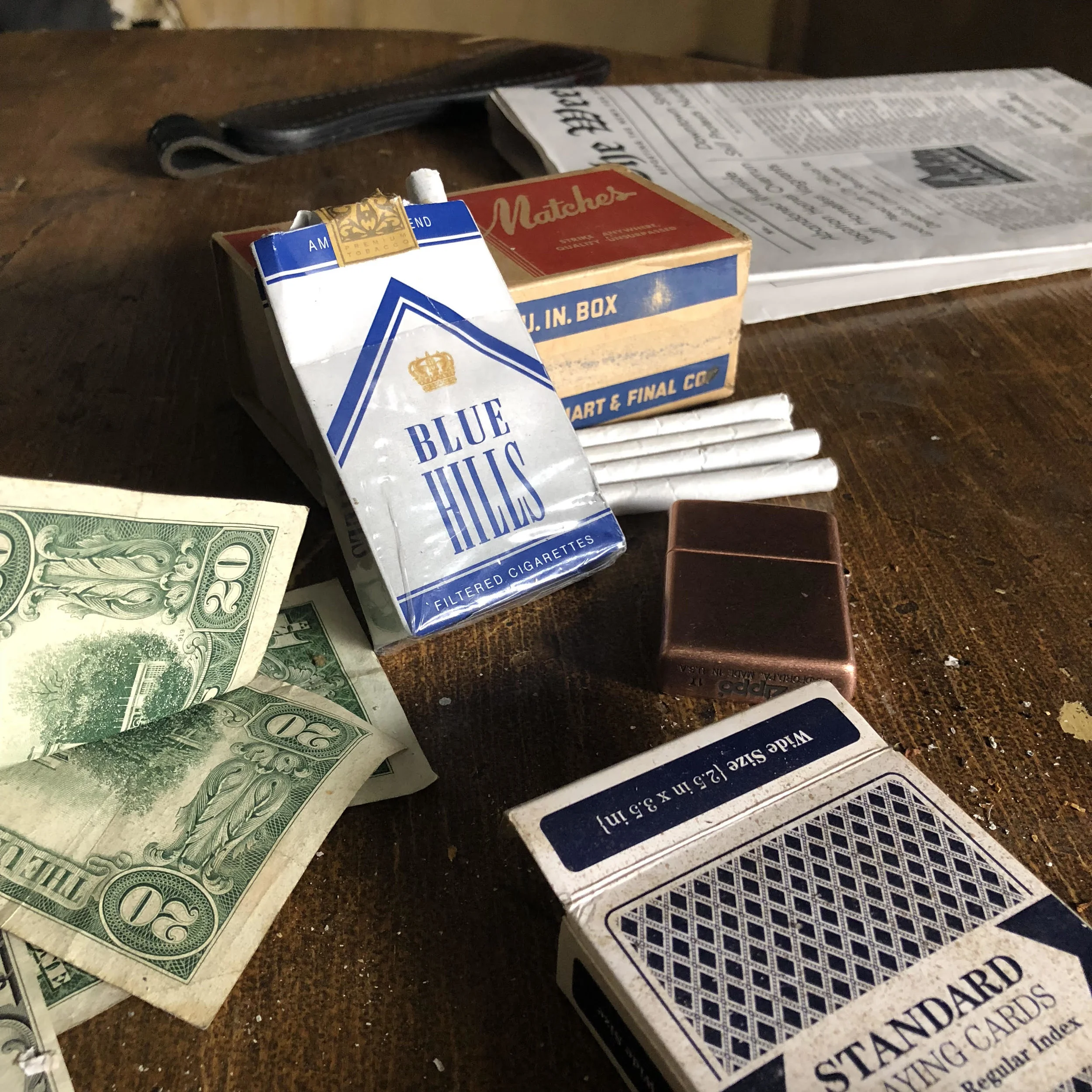 Cigarettes, cards and money - Ellroy essentials. Photo courtesy Drew Powell