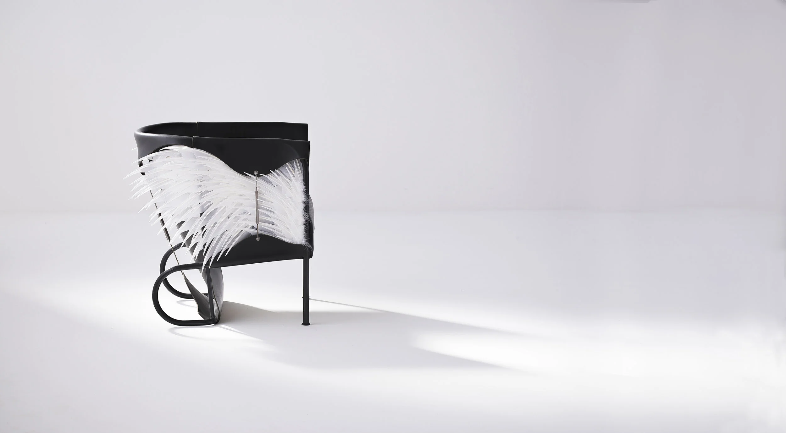 Accoutre_feather_armchair-2 stretch lowres.jpg
