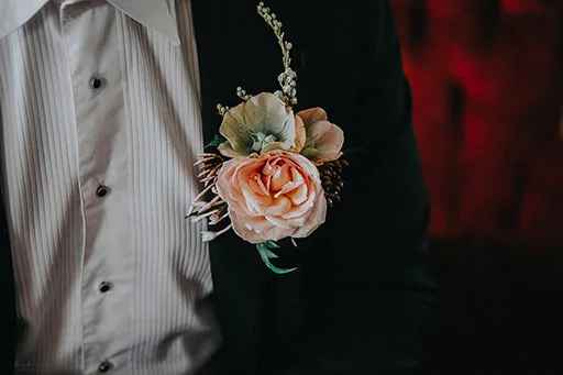 rose-hellebore-buttonhole-wedding-groom.jpg