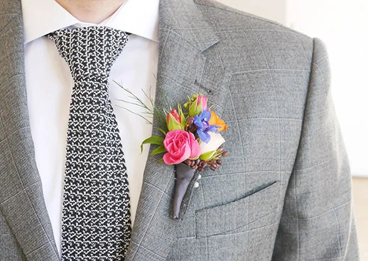 pink-blue-colourful-buttonhole-wedding-groom-flowers.jpg