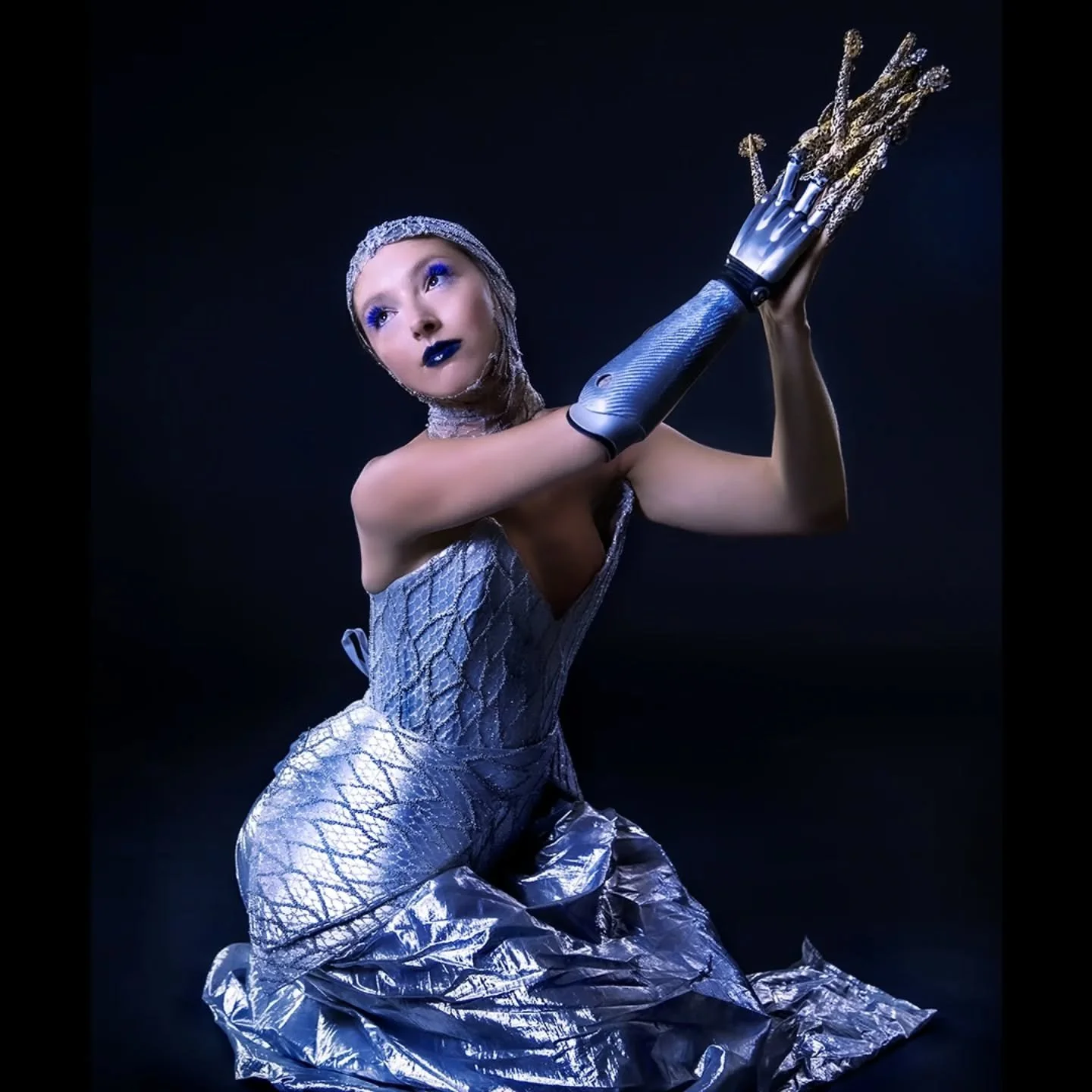 The Shining Silver Empress
We thank the cosmos for her brilliant light in the depth of the abyss

Model: @orlandocyborgashley 
Costume Designer: @sybansyban 
Makeup artist: @alyona.artistry 
Photography: @tomwattsdop