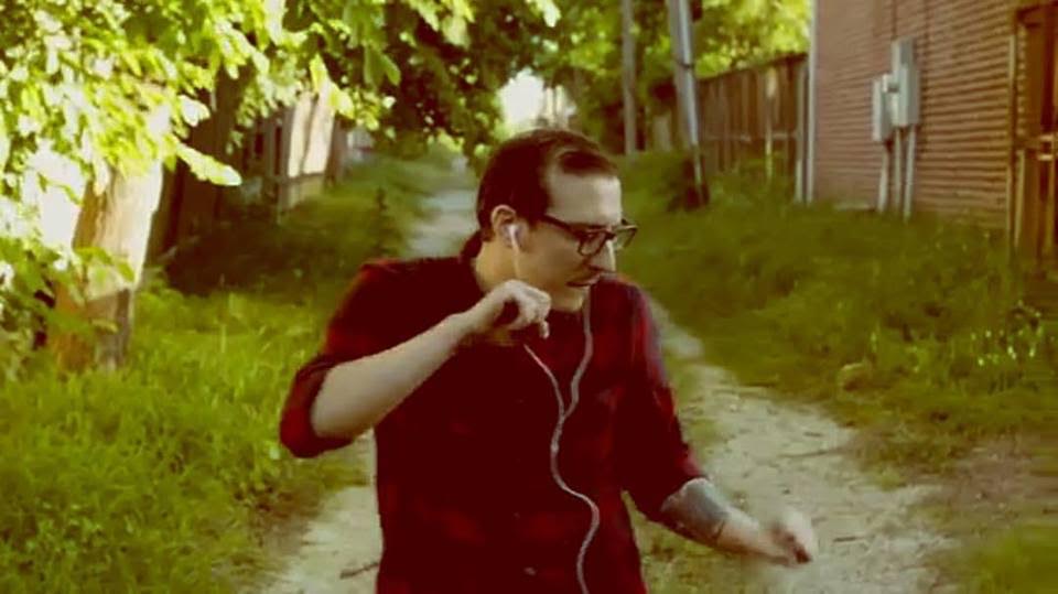 Screen shot of Smith from the Peter Marsh-directed "Lemon Balm" music video by Siberian Traps
