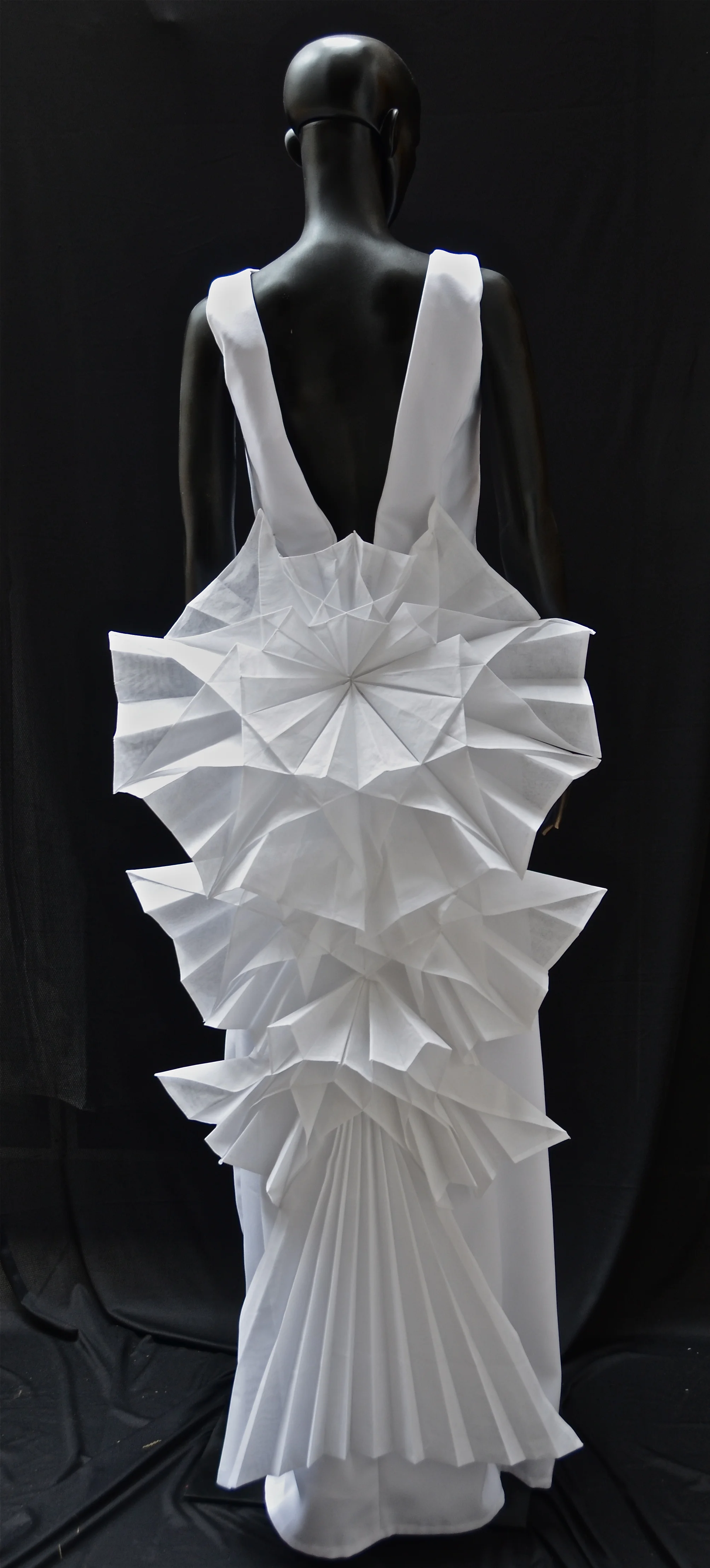 Origami train in cotton organdie fabric.
