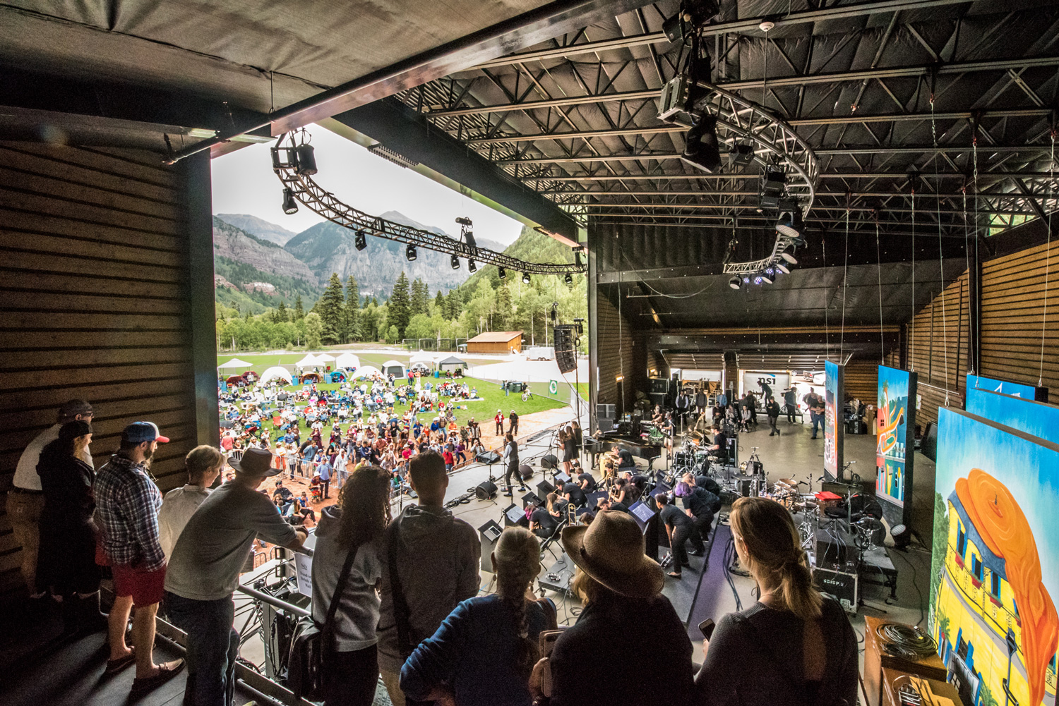 Enjoy an on stage viewing area, close to the performers featuing a beautiful mountain backdrop. 