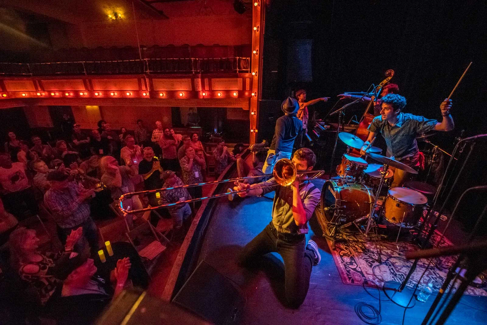 Kick off the festival with a private opening concert at the historic Sheridan Opera House the night before the festival begins.