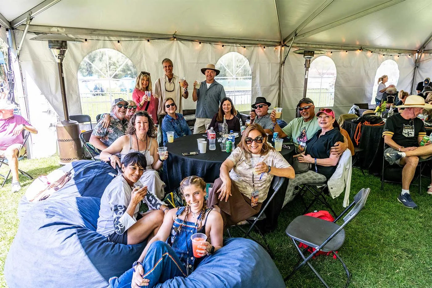 Festival goers enjoy the relaxed vibes of the indoor lounge in the VIP Area at the festival.