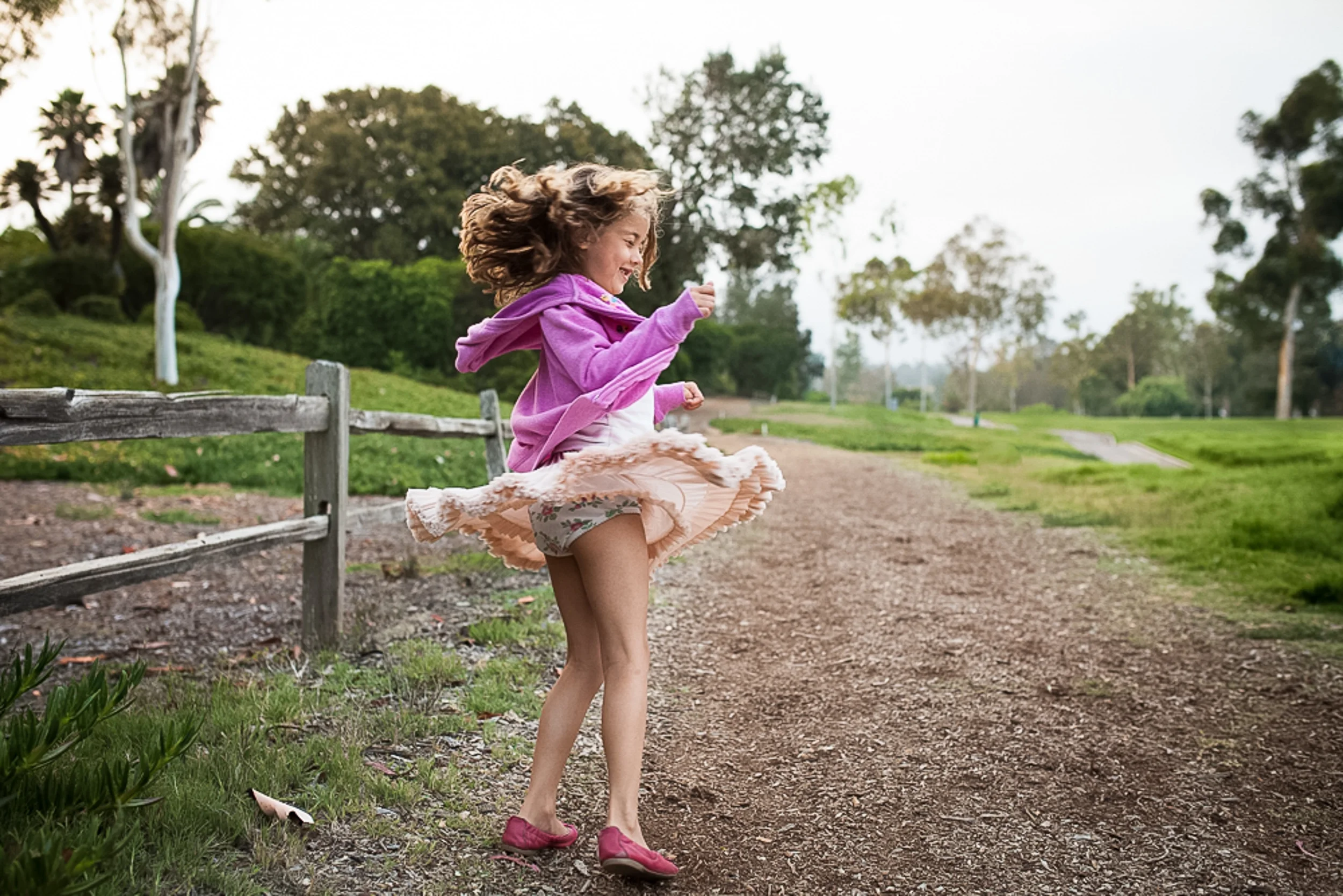 Although my daughter can do a serious face like no one else, sometimes she just enjoys herself and I love to capture that as well. Movement in a photo can make for captivating imagery. This image was taken on a California vacation.