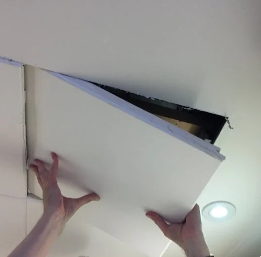 Removing ceiling tiles to access FCUs