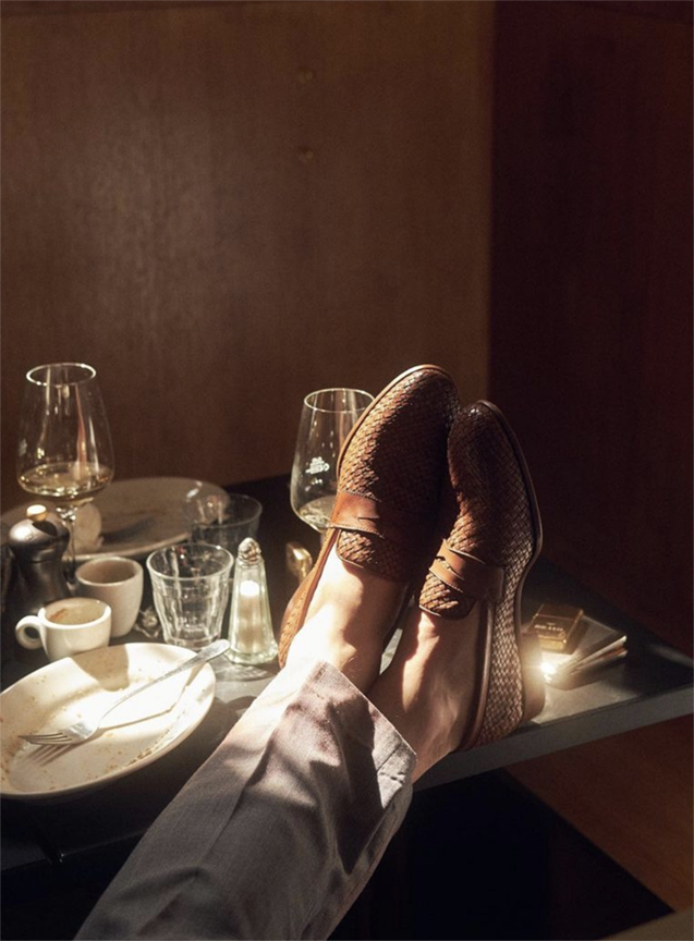 381_loafers_on_table_dappled_lighting.png