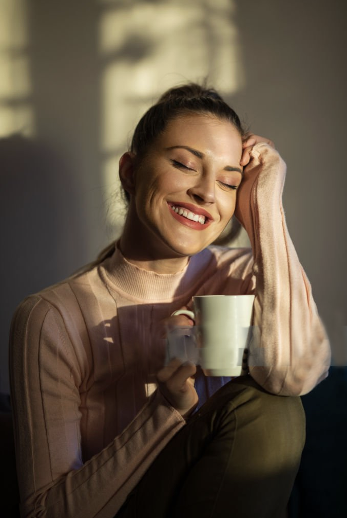 woman drinking coffee moring light.png