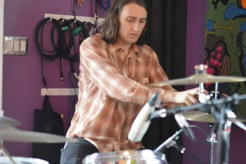 Trev adjusting cymbals**.JPG