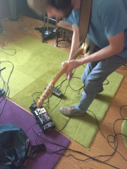 Tim bending to pedals.JPG