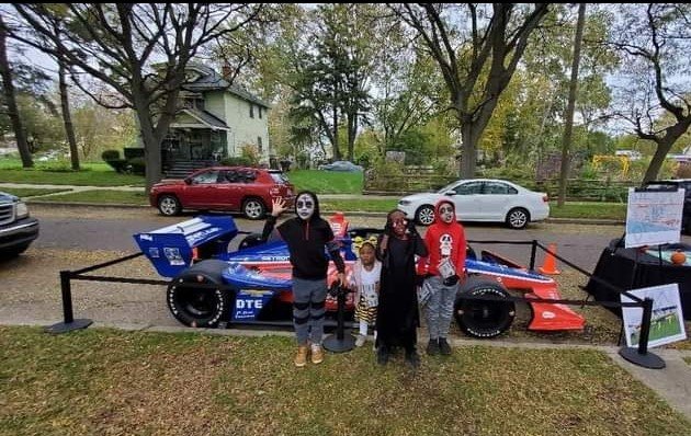 halloween kids by race car.jpg