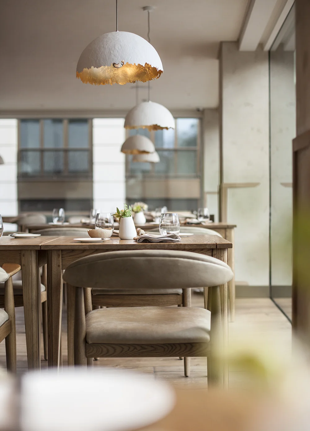 Tables and Chairs at Above restaurant offer parkside views at this prime location overlooking Green Park