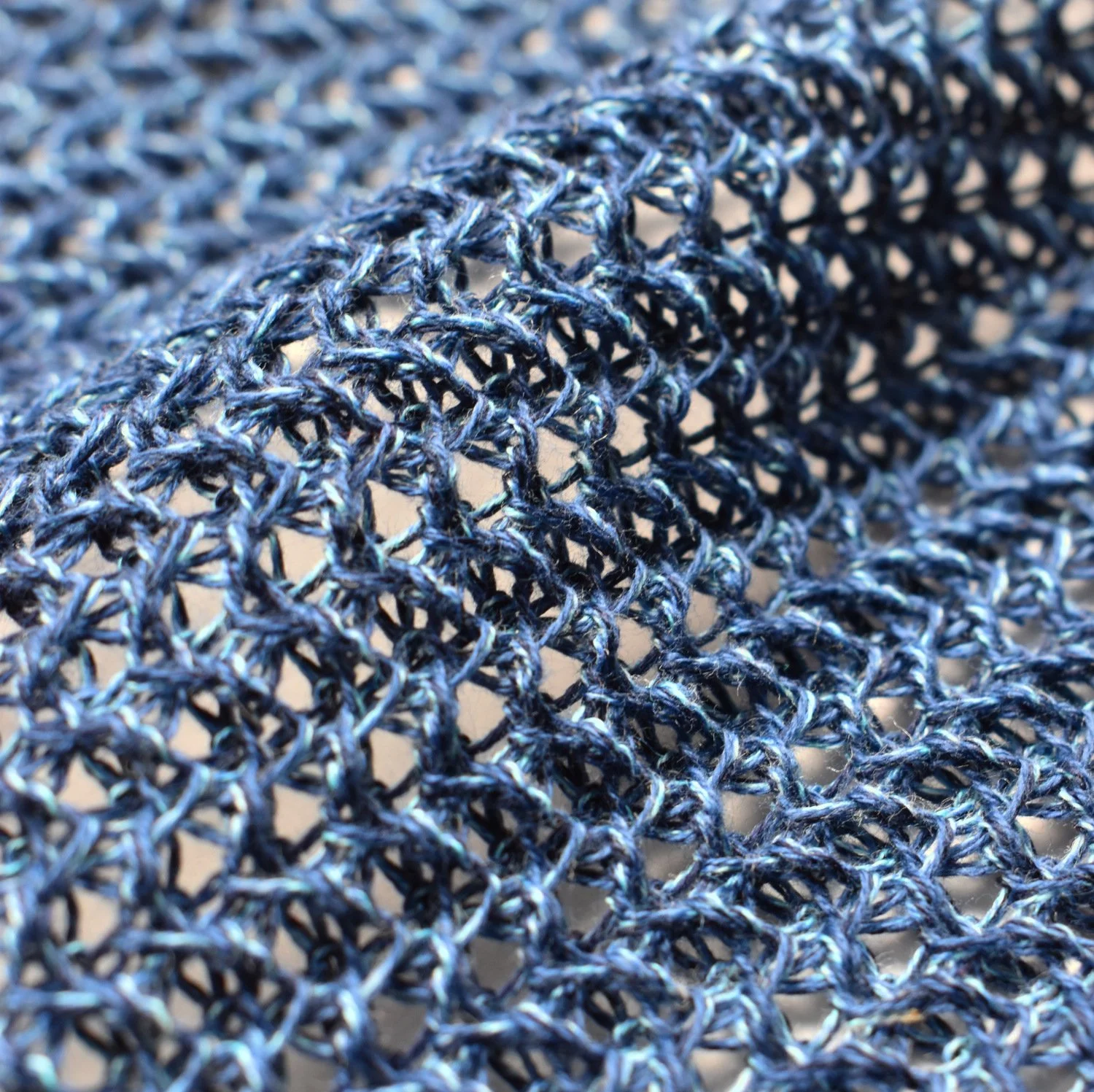 mesh fabric knitted with multiple blue yarns