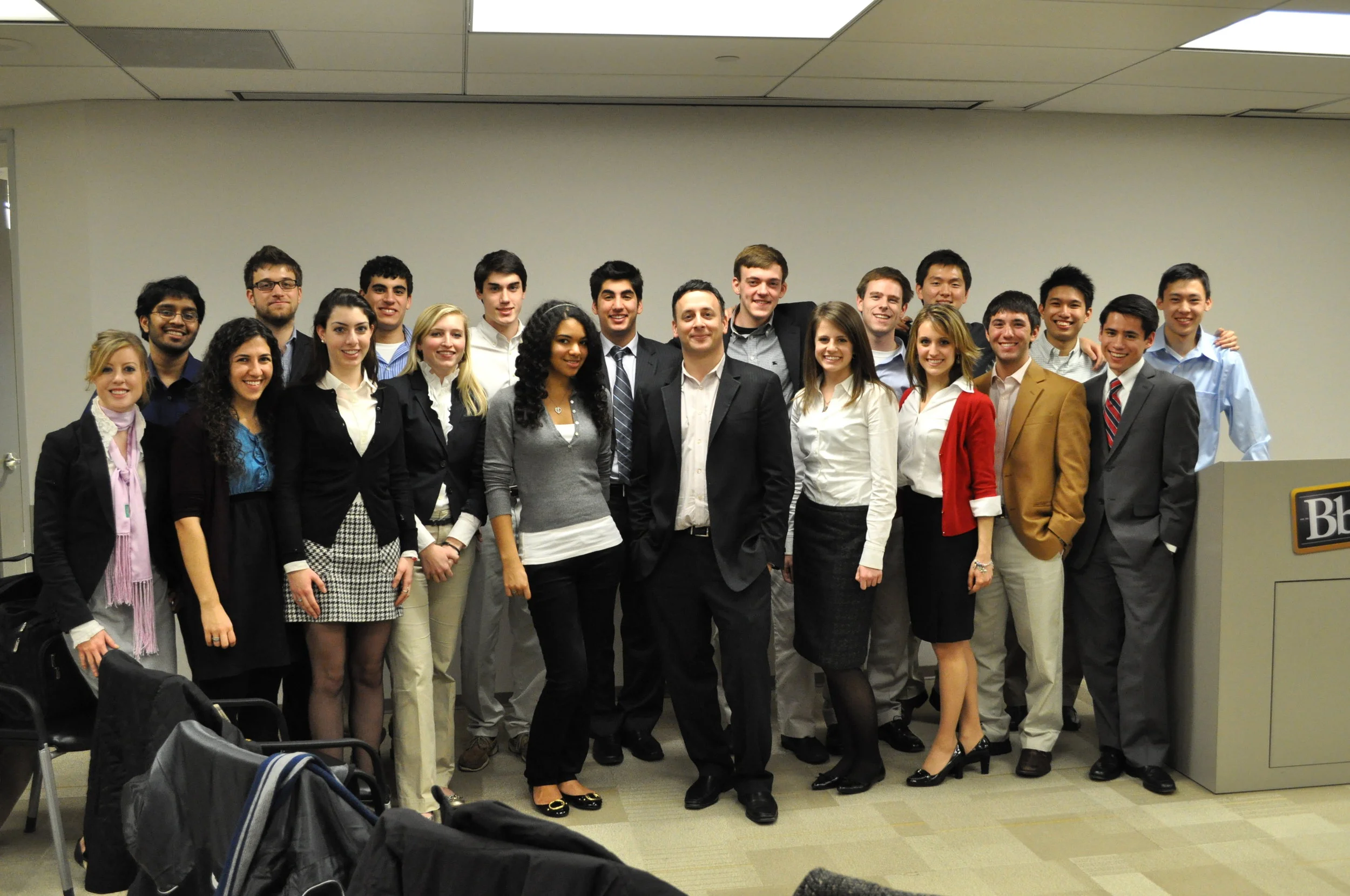 The inaugural class of fellows visiting Michael Chasen, CEO of Blackboard