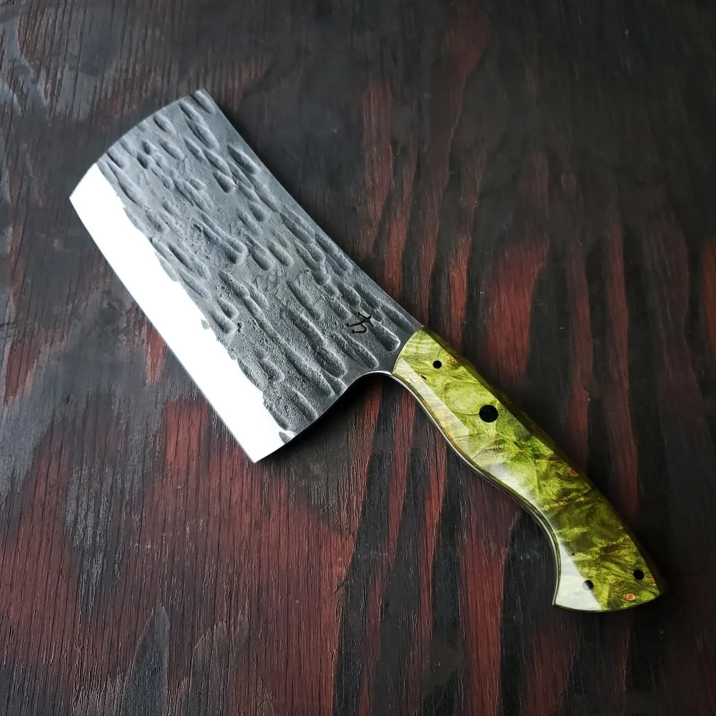 You guys have been loving my cleavers. I have made more this year then ever before. These are just from the last month. All are 1084 carbon steel. They can take a hit to mild steel on the edge and not show any damage.