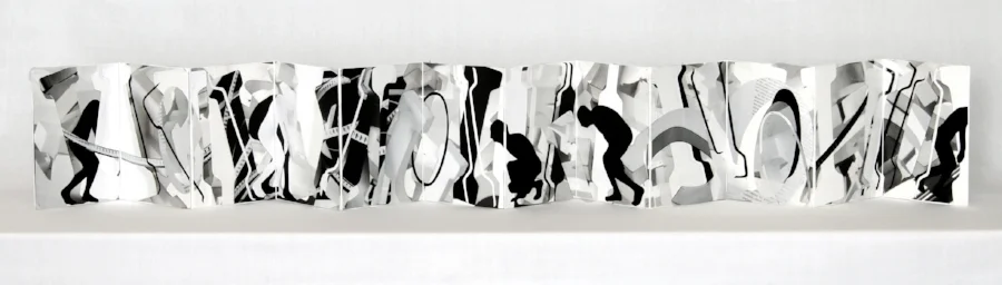 Cynthia Laureen Vogt, Not One Iota , 2016, mixed media artist’s book, 5" x 3.625", unfolds to 43.5" length.