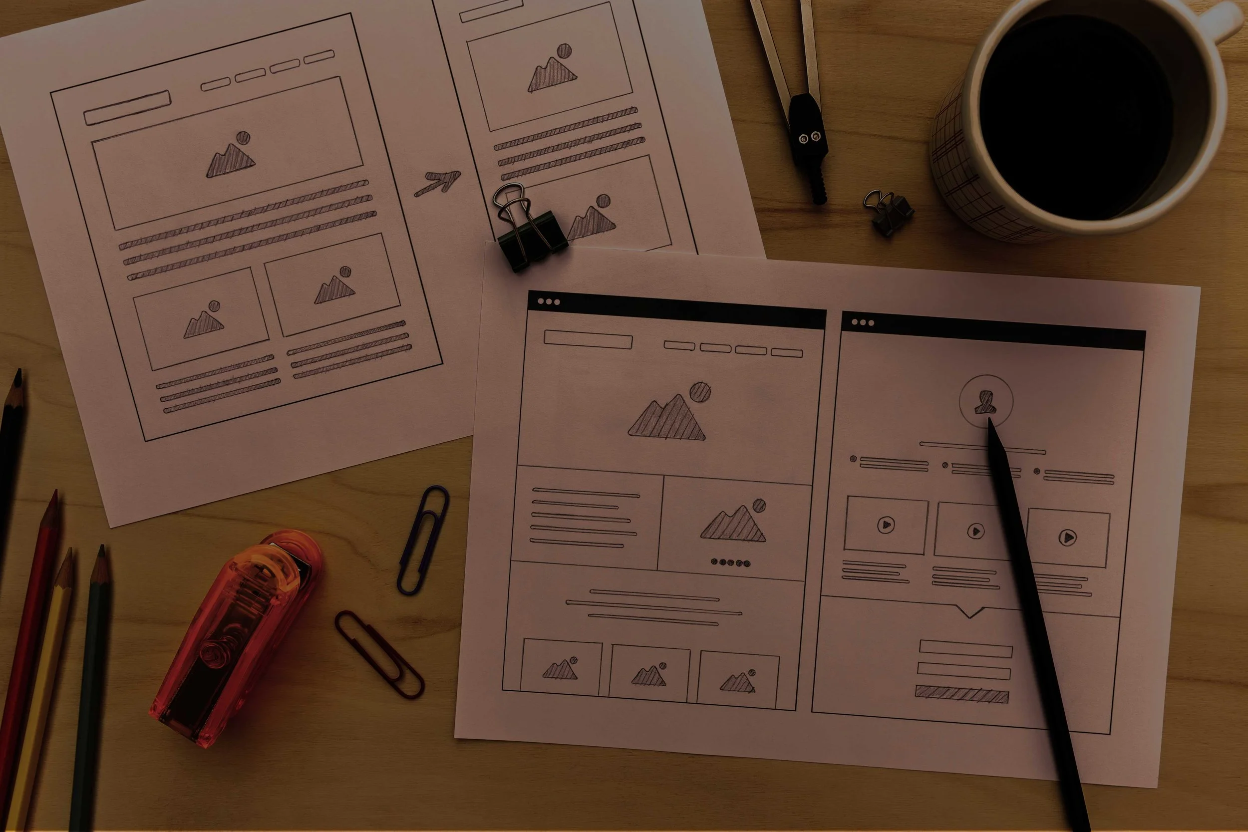 Designer desk with website wireframe sketches-1.jpg