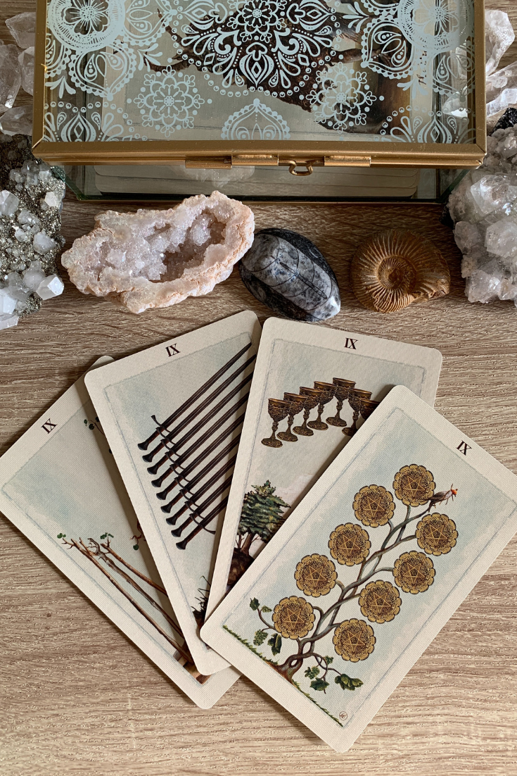 The meaning of getting multiple or lots of nines in a Tarot card reading spread. Here is the interpretation for 9 love and work readings..png