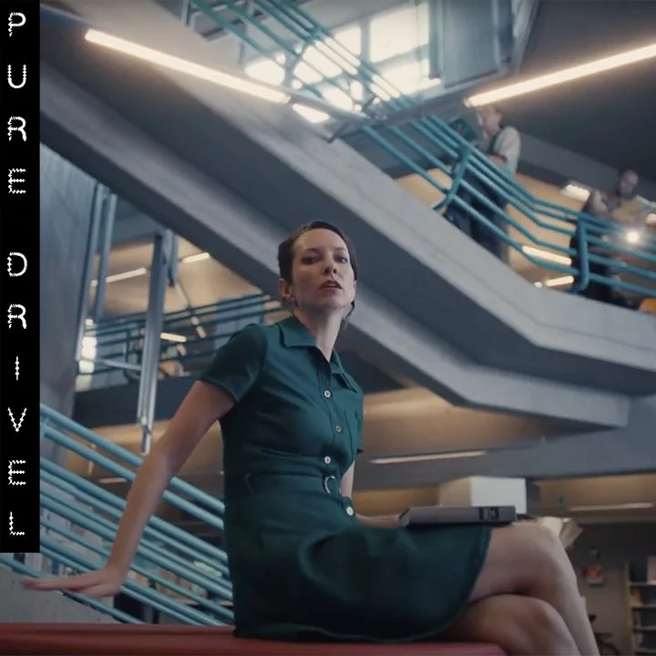 Alex Lilly dances with books in Berlin for the new "Pure Drivel" clip