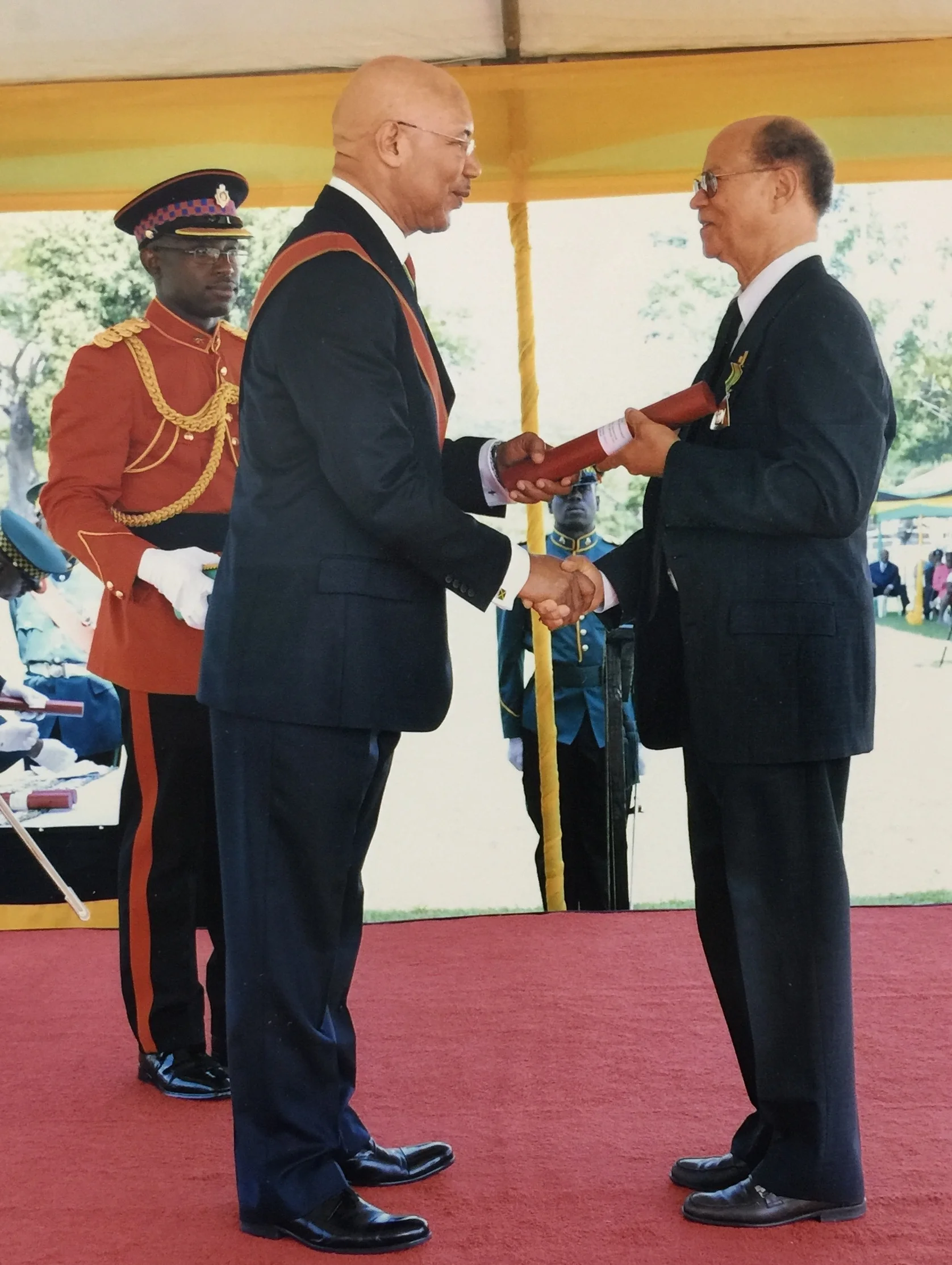 Tower Isles' President Mr. Patrick Jolly OD receiving his Order of Distinction; presented to him by the government of Jamaica by the Governor General of Jamaica.