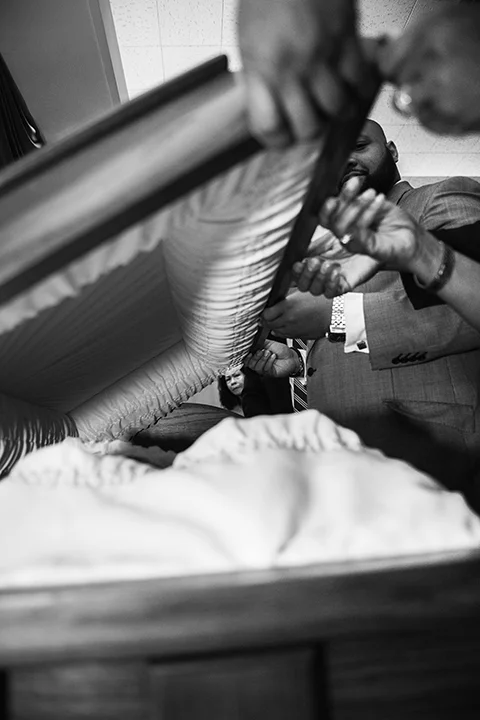 "Lowering the Lid" © Hasna Muhammad