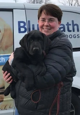 Nicole and her second BluePath puppy, Journey.