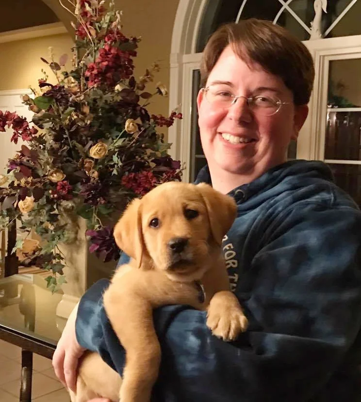 Nicole and her first BluePath puppy, Pearl.