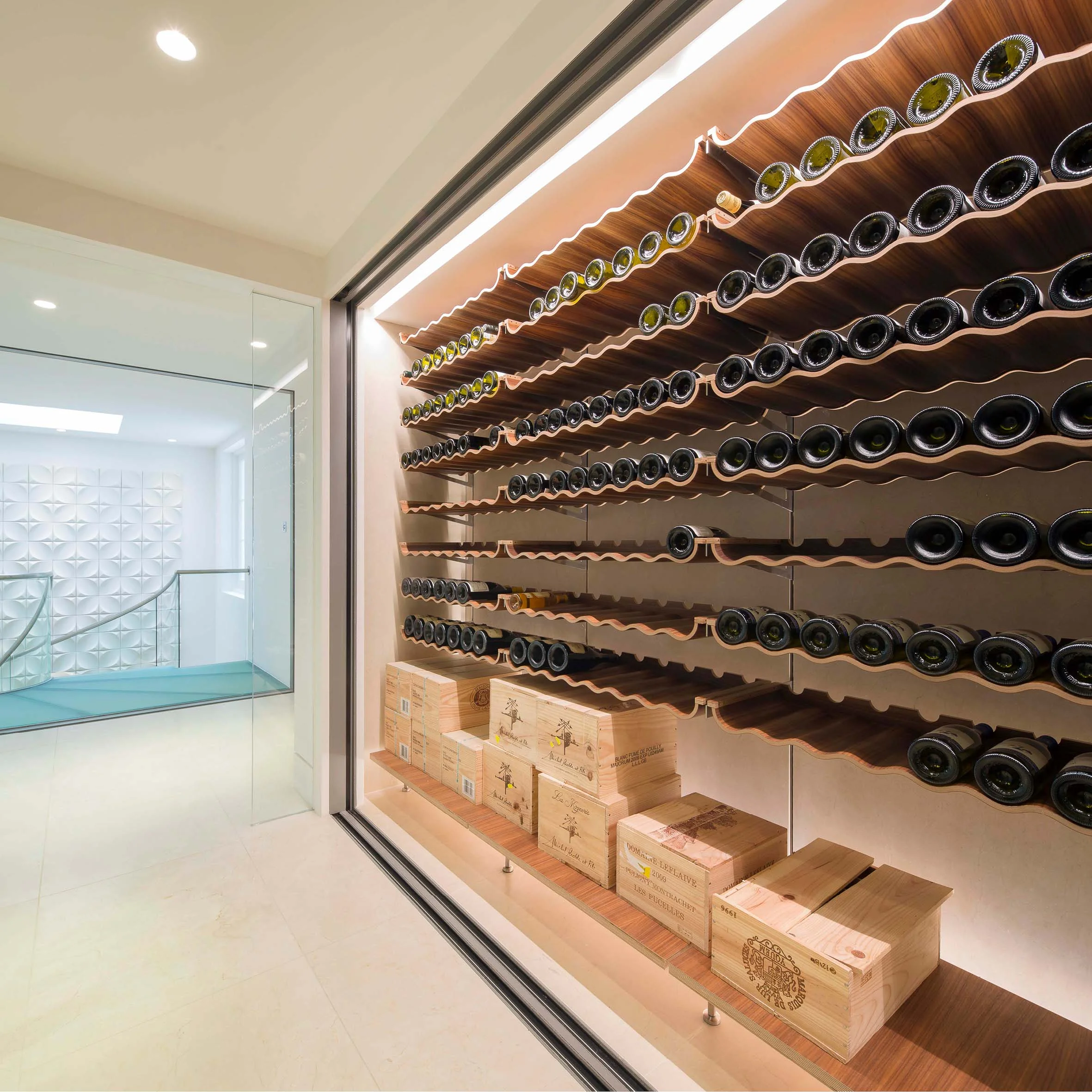 The 200 bottle wine store linking the main house to the swiming pool.