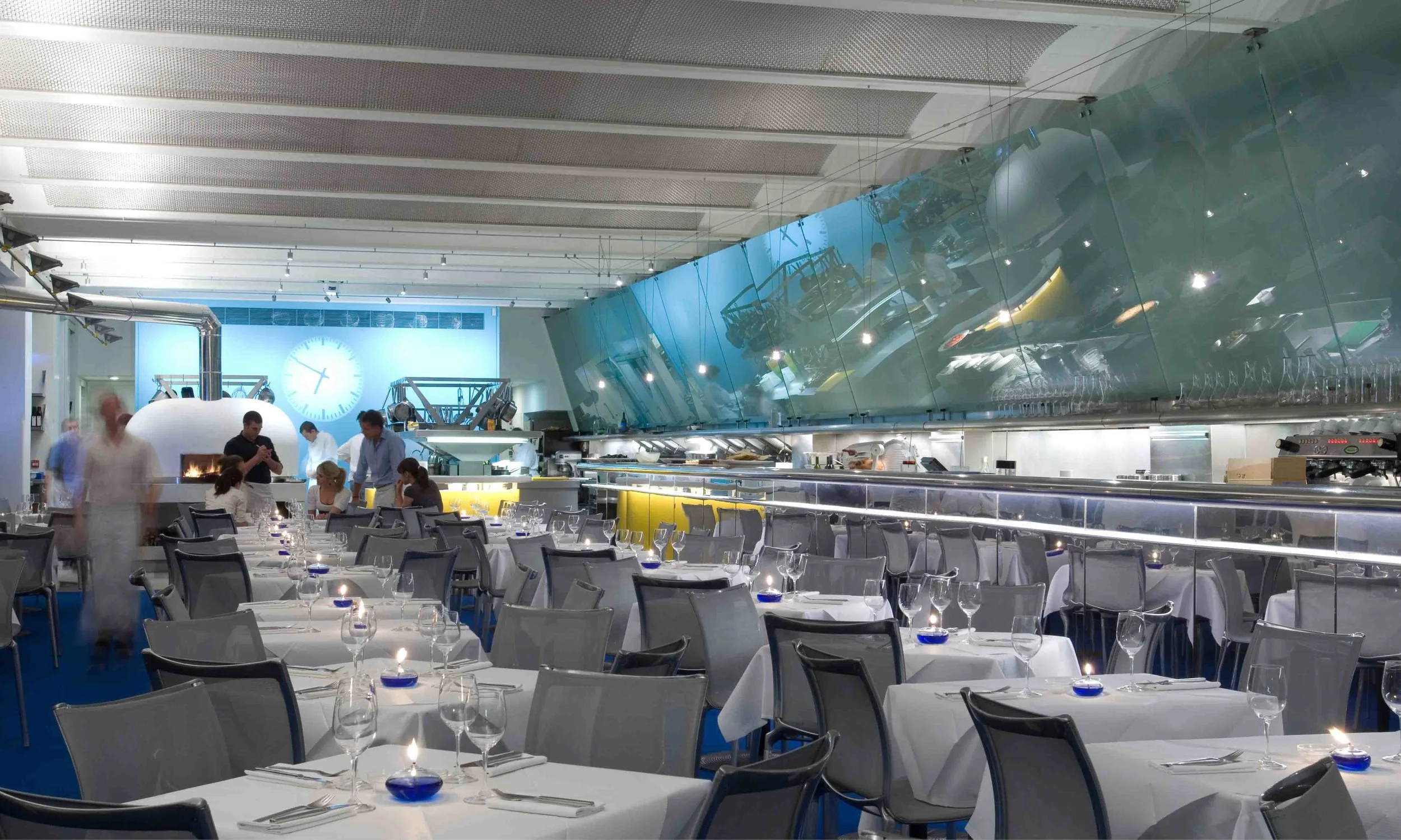 Ruth Rogers, Rose Gray. Designed in partnership with Rogers Stirk Harbour and Partners the River Cafe was refurbished following a fire in 2008. The refurbished restaurant how has a private dinning room and a cocktail bar.
