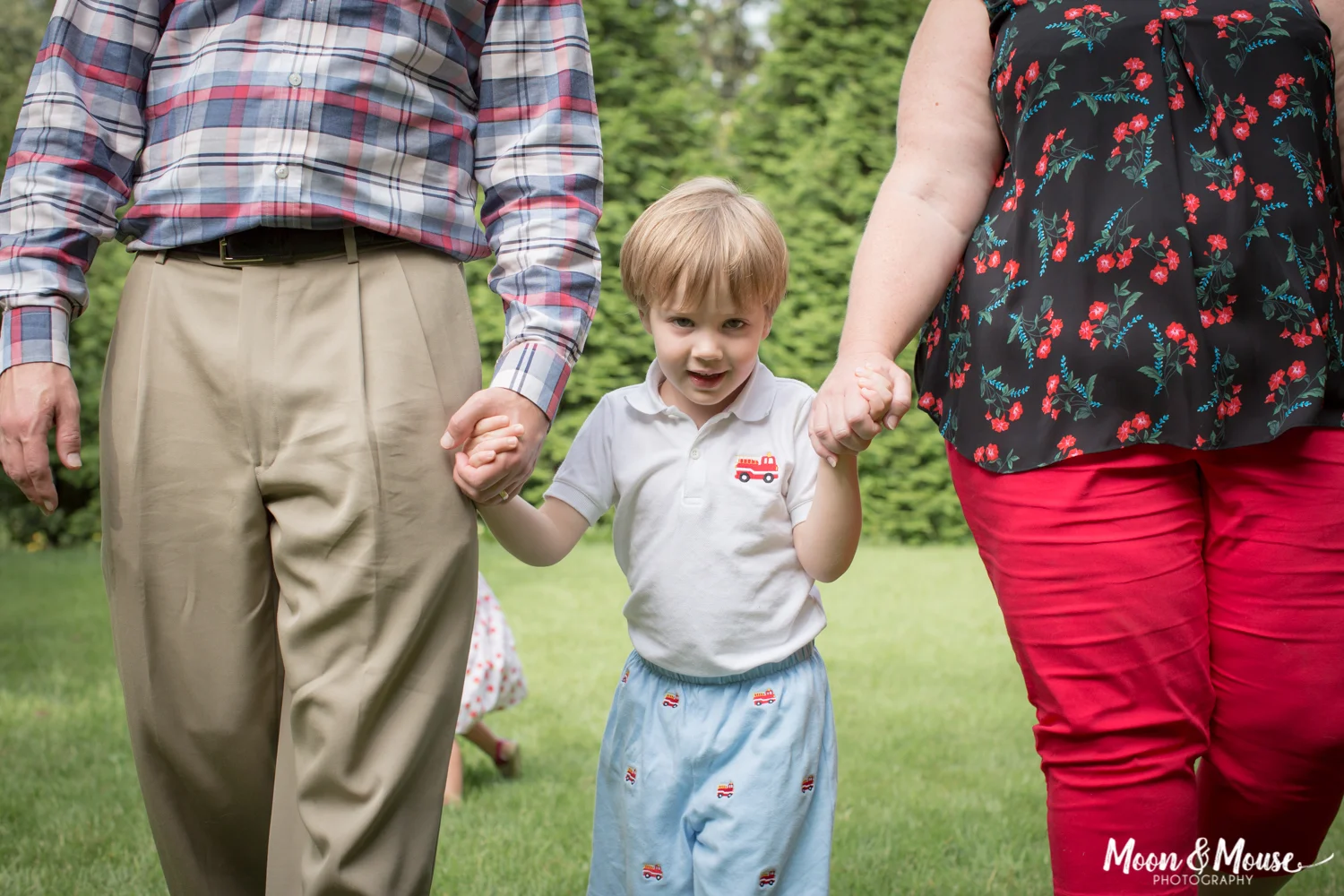 Birthday Party Family Photography in Atlanta, GA. Boy and Parents Walking.