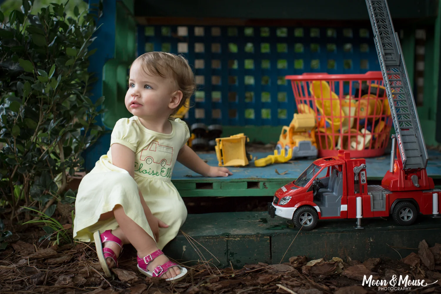 Girl with Firetruck. Childhood photography, outdoors Atlanta, GA