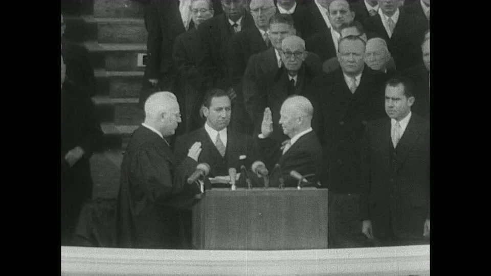 As then-Vice President Nixon looks on, Earl Warren administers President Eisenhower his second oath of office in 1957. Photo courtesy Dwight D. Eisenhower Presidential Library.
