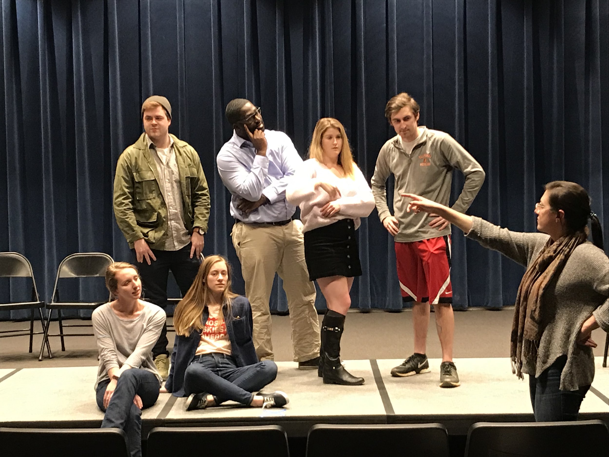 Nicole Llinares ‘19 gives stage directions to a group of actors. Photo credit Kim Hopkin ‘19.