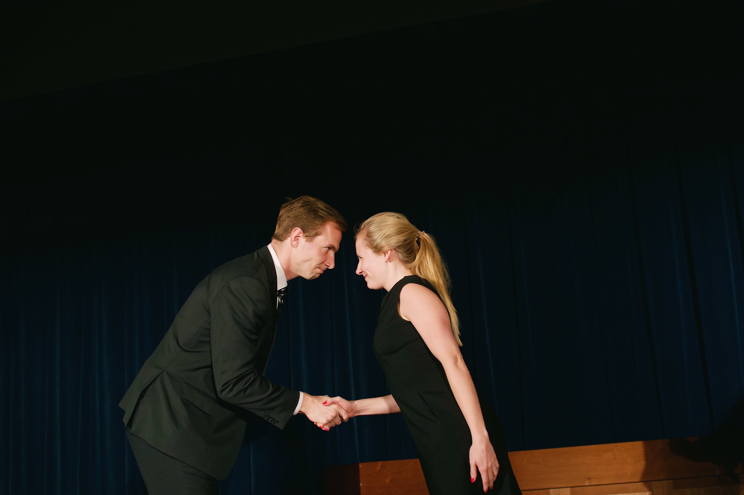 David Gremling ‘19 and Kat Collins ‘19 as Professors Paul and Julia Mahoney prepare to give each other a fair shake in the competition. Photo credit Kolleen Gladden ‘21.