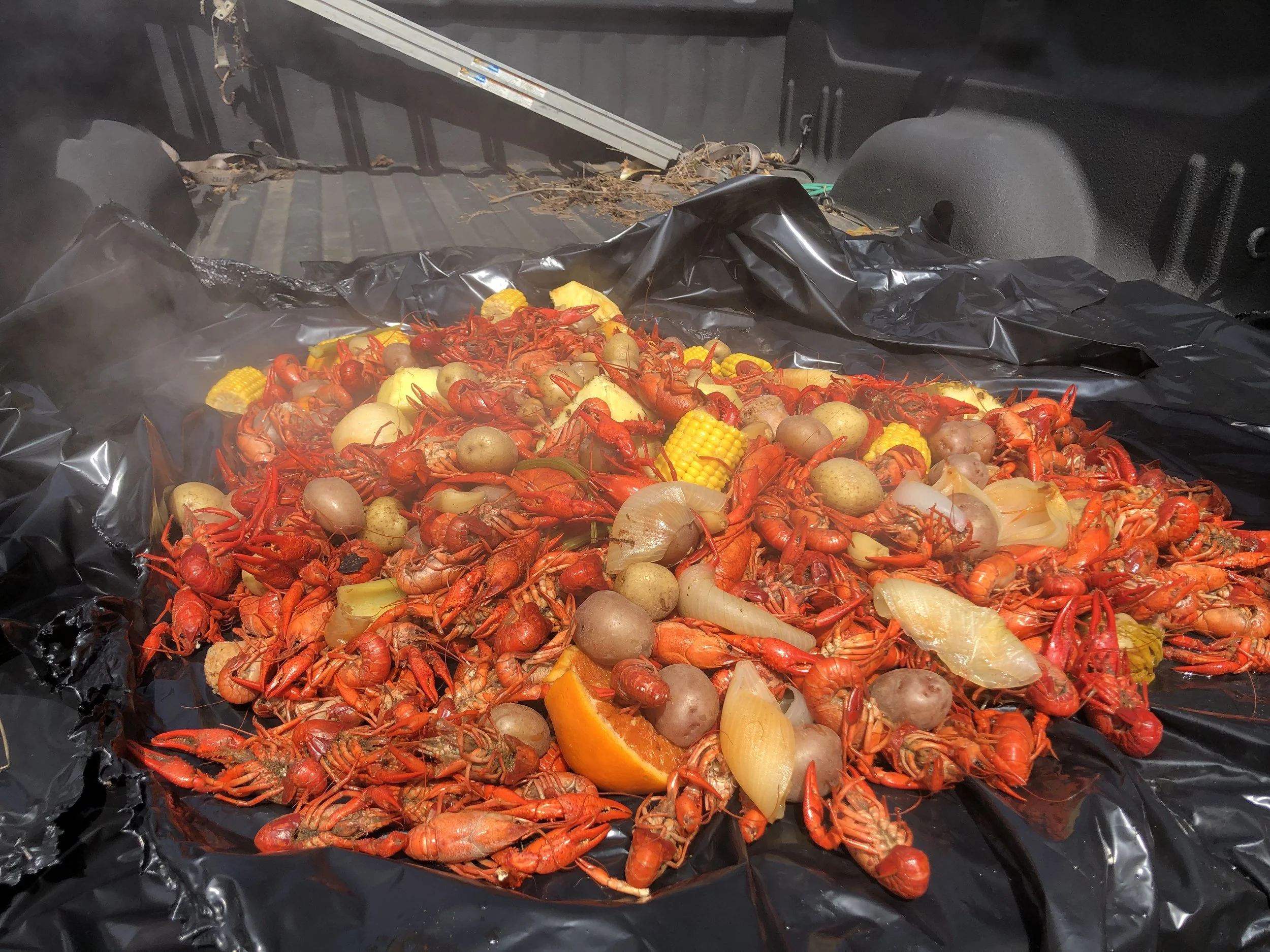 Crawfish served a la gourmet truckbed trash bag. Photo courtesy of Grace Tang ’21.