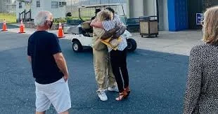 Pictured: Professor Deirdre Enright who supervises the Innocence Porhect, celebrates with Rojai. Photo Courtesy of law.virginia.edu