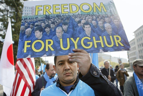 Pictured: Uyghur people protest outside the UN headquarters in Genevea in November 2018. Photo courtesy of: Salvatore Di Nolfi/EP