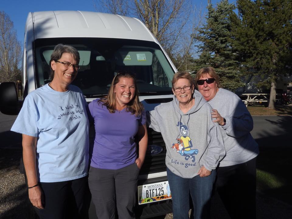 The crew happy after an awesome day filled with geysers, hot springs, wildlife, and lots of laughs!