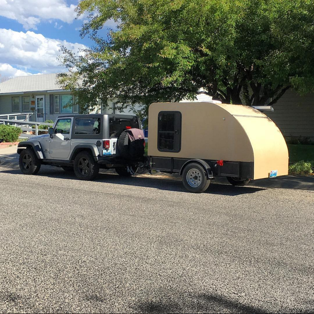 I built this teardrop camper in my garage while we lived in Alabama. It weighed less than 1,000 lbs, or about half of the 2 door JK's towing capacity. To put things in perspective, the RAM's payload is 500 lbs greater than the JK's towing capacity!