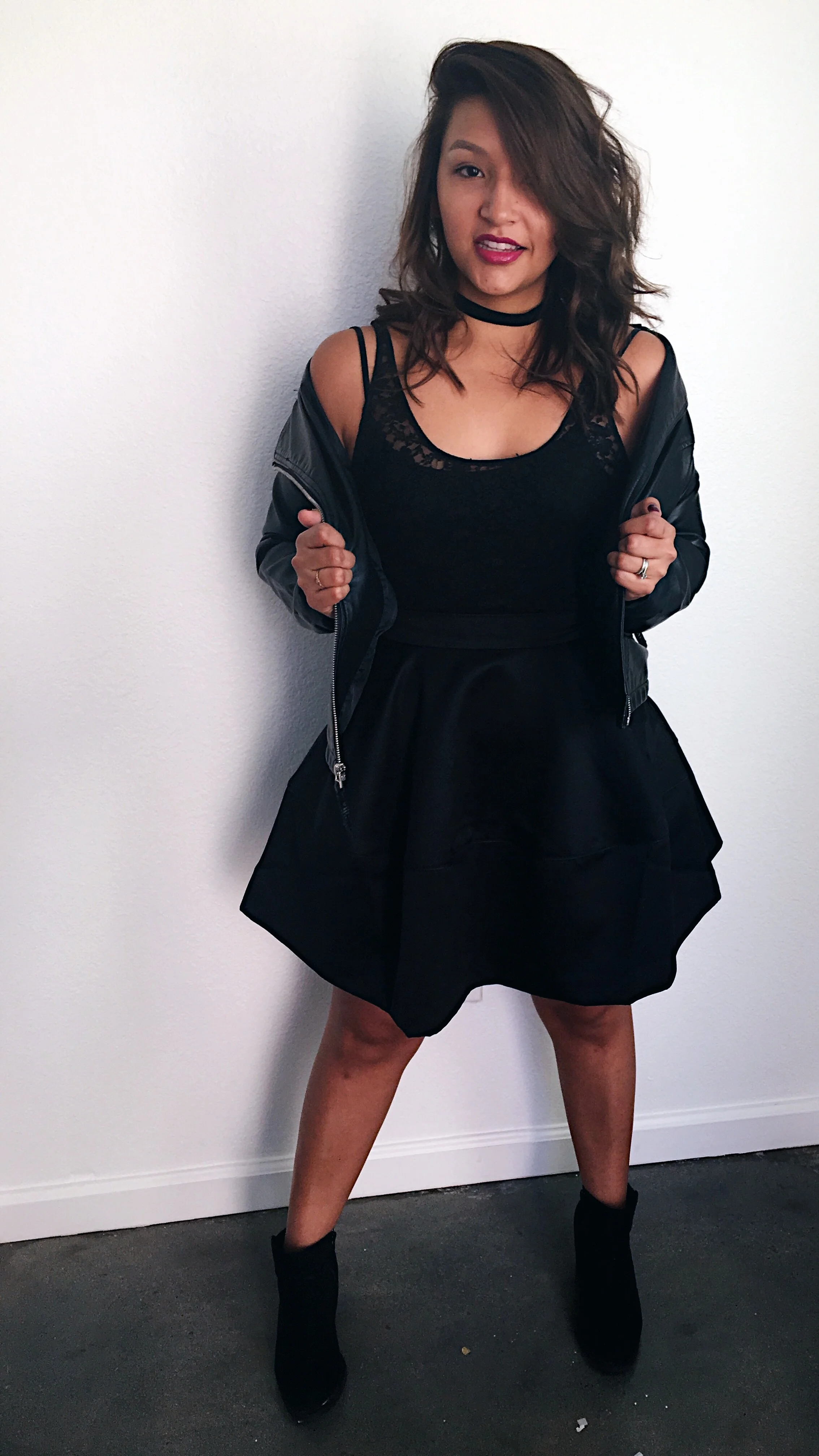 Holiday Party Fashion/ Lace Bodysuit with satin skater skirt/ Black suede choker/ black ankle boots and leather jacket