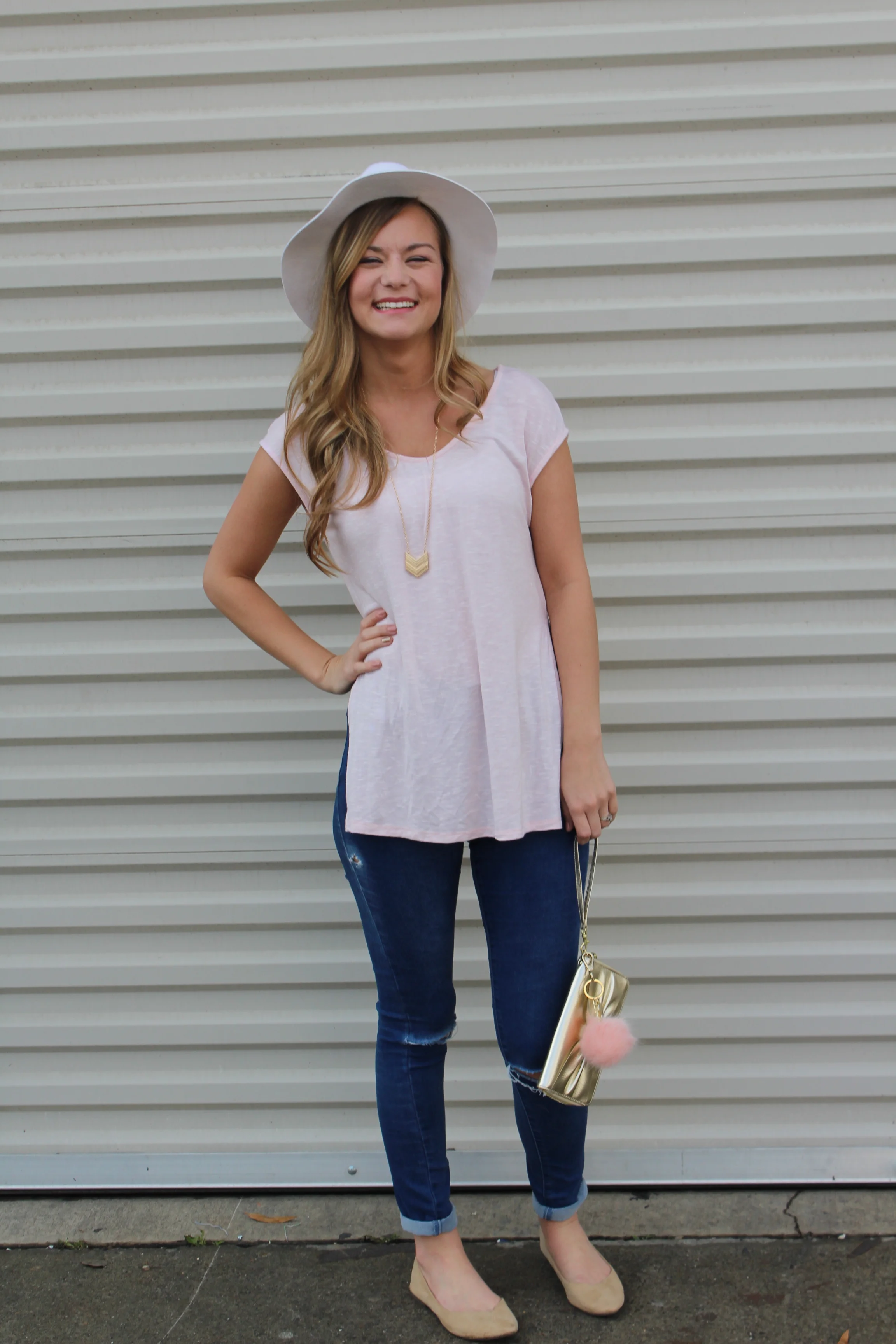 Wool Fedora Hat with a blush pink tee shirt/ Denim Jeans with a Gold Bow Wristlet Bag/ Pink Pom Pom Fuzzy Keychain 