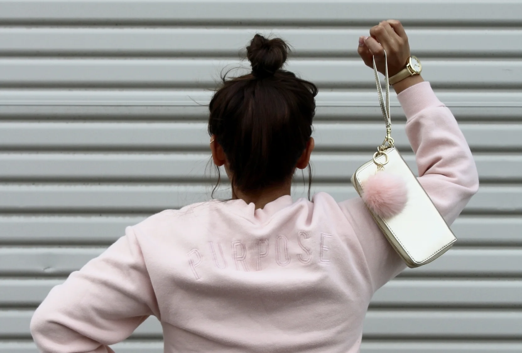 Top Knot Bun/ Blush Pink Purpose Sweatshirt/ Gold Clutch Wristlet with a pink pom pom keychain 