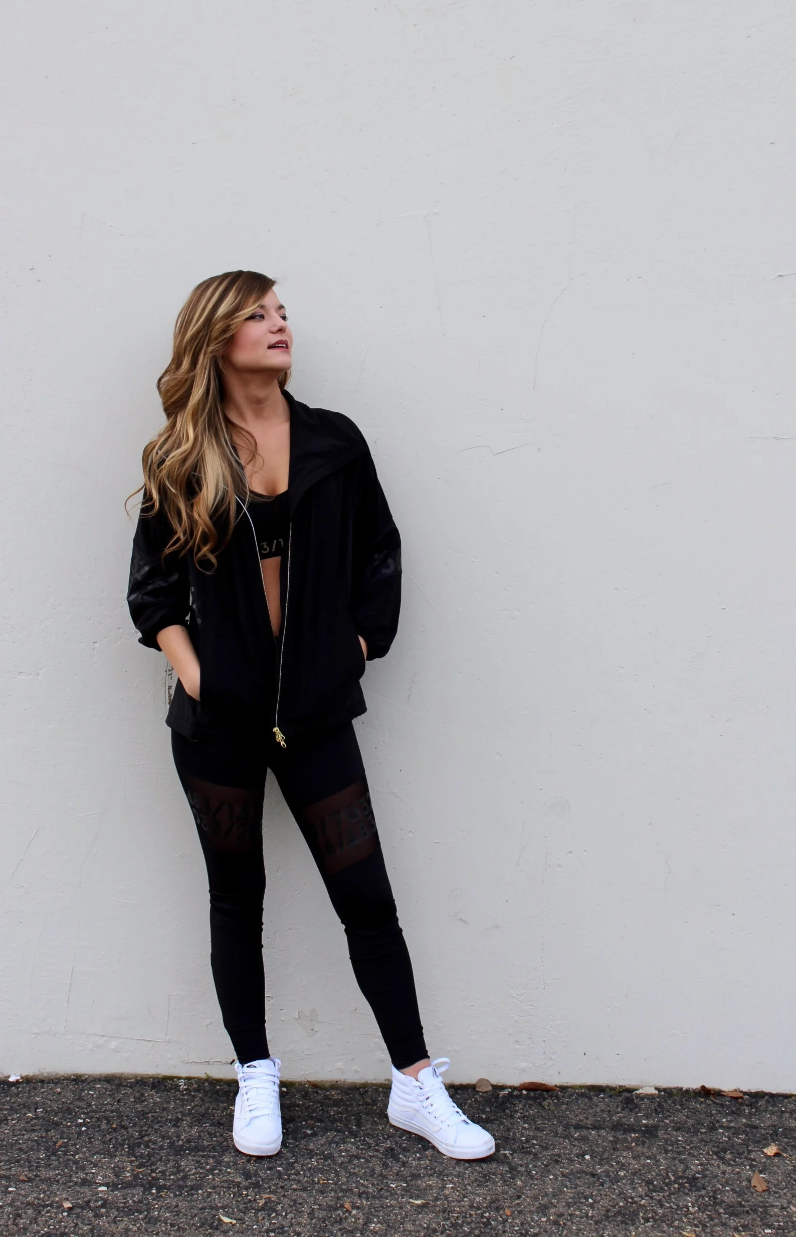 All Black workout outfit. Wind Breaker 3/4 Sleeve Jacket with Black Sports Bra from H&M 