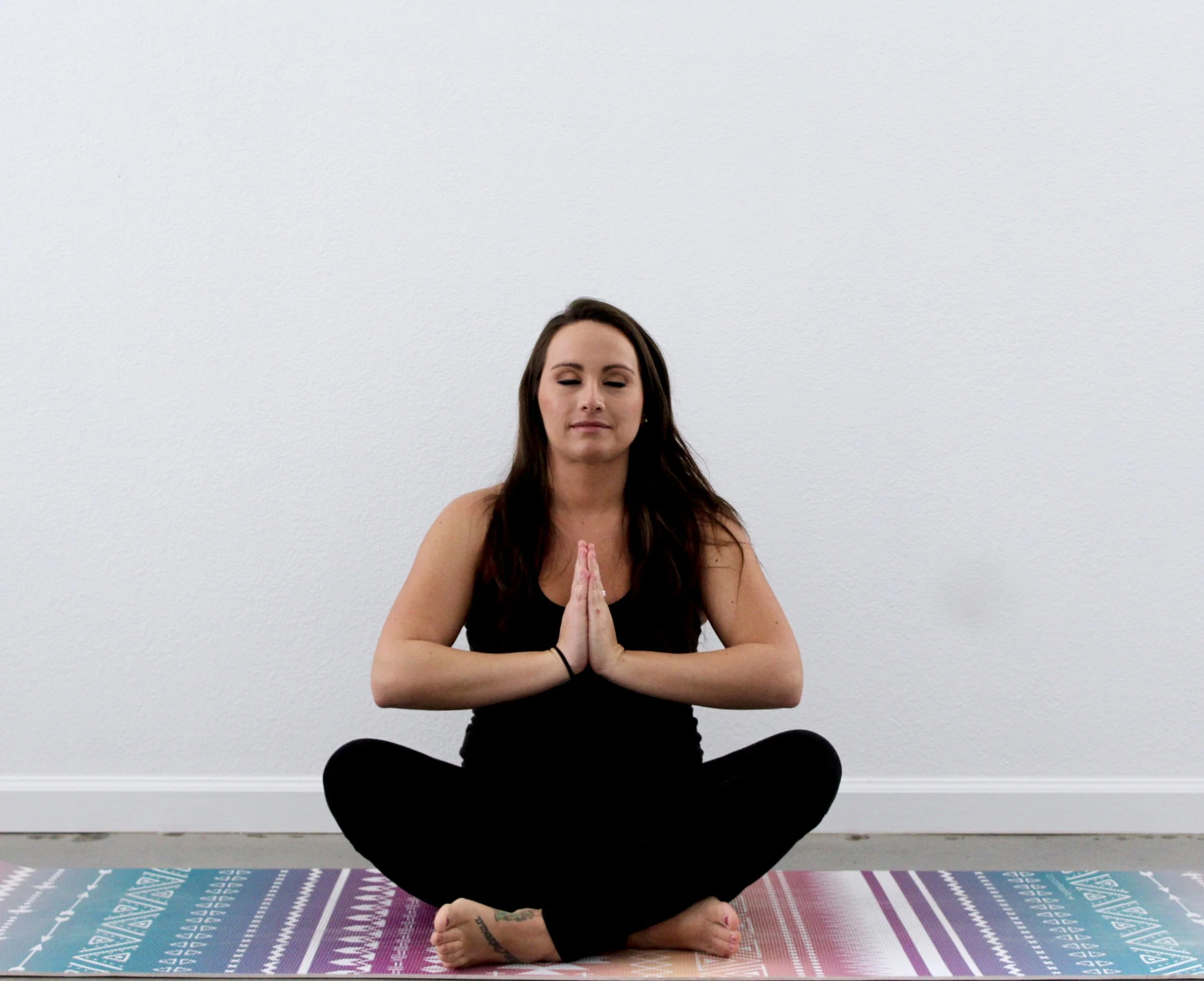 Namaste. Yoga instructor Michelle Trabucco 